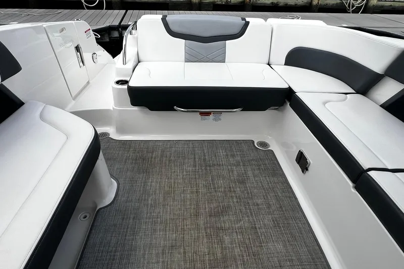 Slide: The Image of 2020 Chaparral 297 SSX boat interior with sleek seating and modern design. - 7