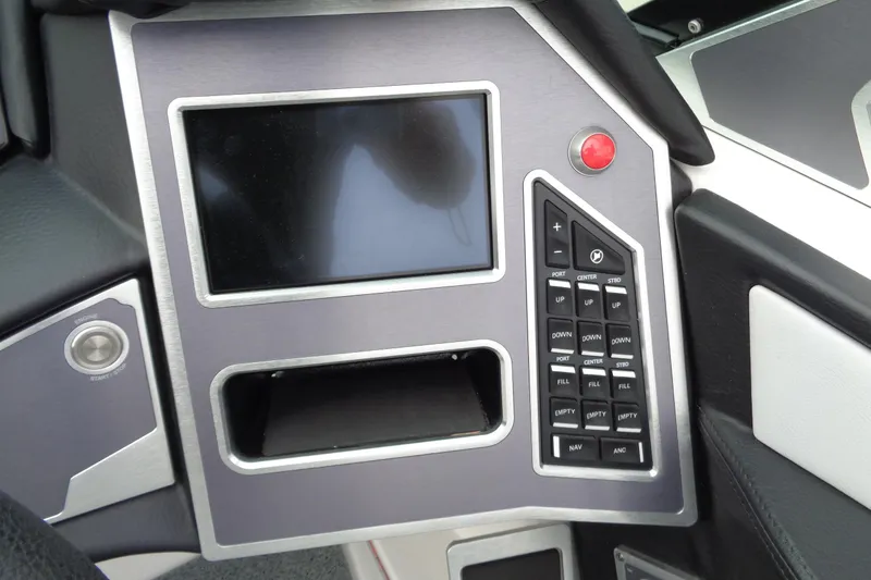 Slide: The Image of Control panel of a 2020 MasterCraft XT23 boat with touchscreen and buttons. - 34