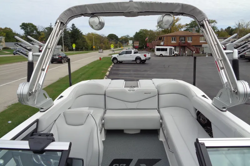 Slide: The Image of 2020 MasterCraft XT23 boat interior with sleek seating and modern design. - 36