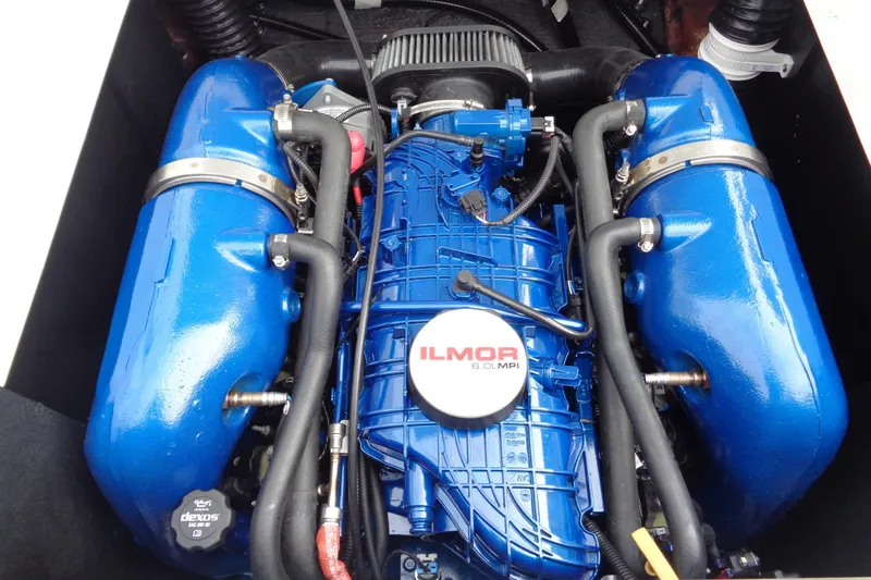 Slide: The Image of 2020 MasterCraft XT23 Ilmor 6.0L MPI engine with blue components. - 8