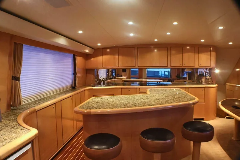 Slide: The Image of Luxurious interior of 2001 Donzi 73 Sport Yacht with elegant wood and granite finishes. - 11