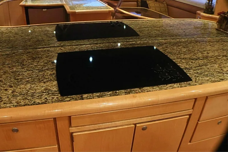 Slide: The Image of Luxurious kitchen interior of 2001 Donzi 73 Sport Yacht with granite countertops. - 15