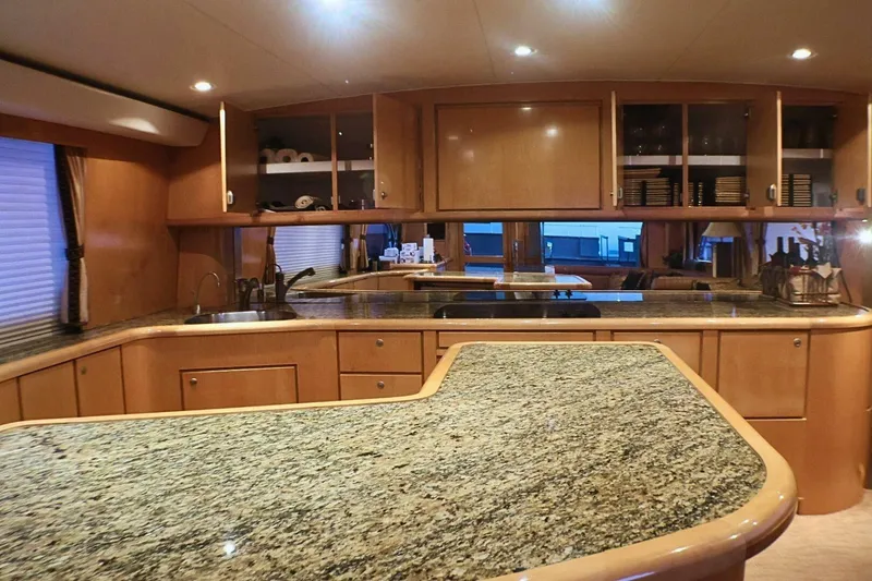 Slide: The Image of Luxurious kitchen interior of 2001 Donzi 73 Sport Yacht with granite countertops. - 16
