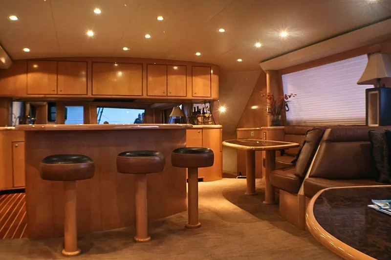 Slide: The Image of Luxurious interior of 2001 Donzi 73 Sport Yacht with elegant seating and bar area. - 17