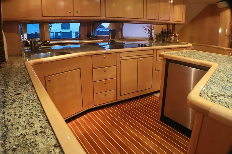 Slide: The Image of Luxurious kitchen interior of 2001 Donzi 73 Sport Yacht with granite countertops. - 2