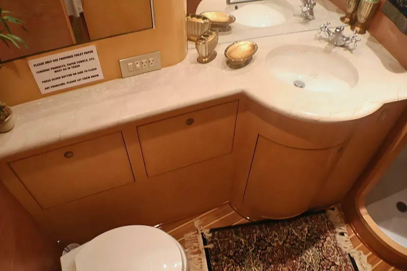 Slide: The Image of Luxurious bathroom interior of 2001 Donzi 73 Sport Yacht with elegant fixtures and decor. - 30