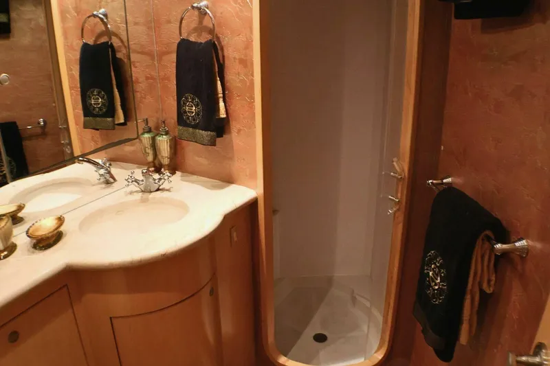 Slide: The Image of Luxurious bathroom in 2001 Donzi 73 Sport Yacht with elegant fixtures and decor. - 31