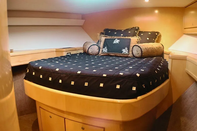 Slide: The Image of Luxurious bedroom interior of 2001 Donzi 73 Sport Yacht with elegant bedding. - 32