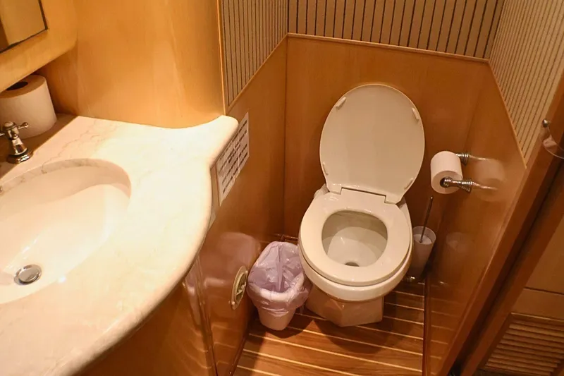 Slide: The Image of Bathroom interior of 2001 Donzi 73 Sport Yacht with toilet and sink. - 43