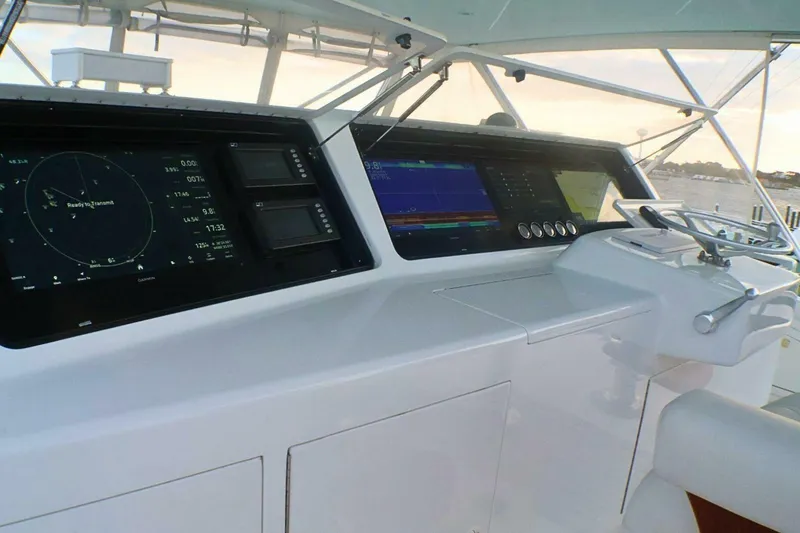 Slide: The Image of Helm of 2001 Donzi 73 Sport Yacht with advanced navigation displays. - 49