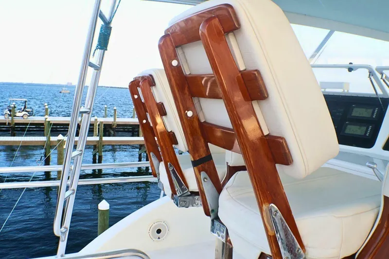 Slide: The Image of Luxury seating on 2001 Donzi 73 Sport Yacht, overlooking marina and ocean. - 54