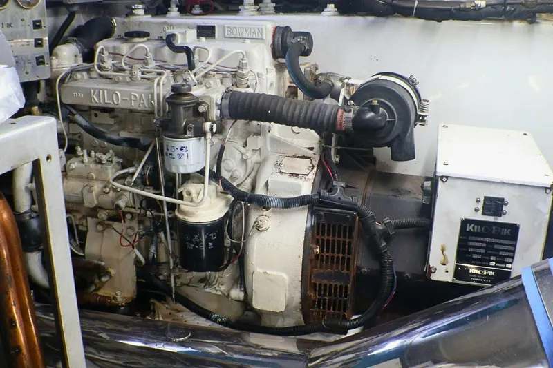 Slide: The Image of Engine room of 2001 Donzi 73 Sport Yacht, featuring Kilo-Pak generator. - 72