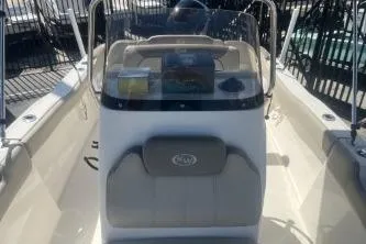 Slide: The Image of 2022 Key West 203 DFS boat interior with steering console and seating. - 10