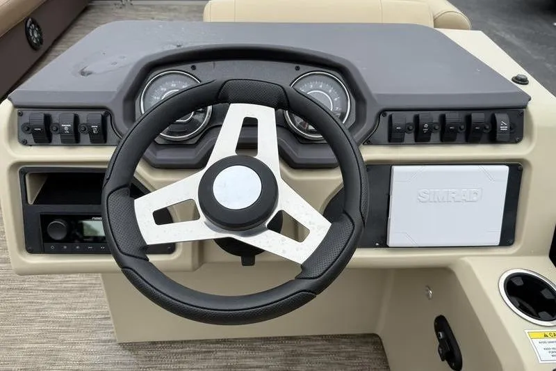 Slide: The Image of Steering console of 2023 Godfrey Sweetwater 2286 C boat with Simrad display. - 7