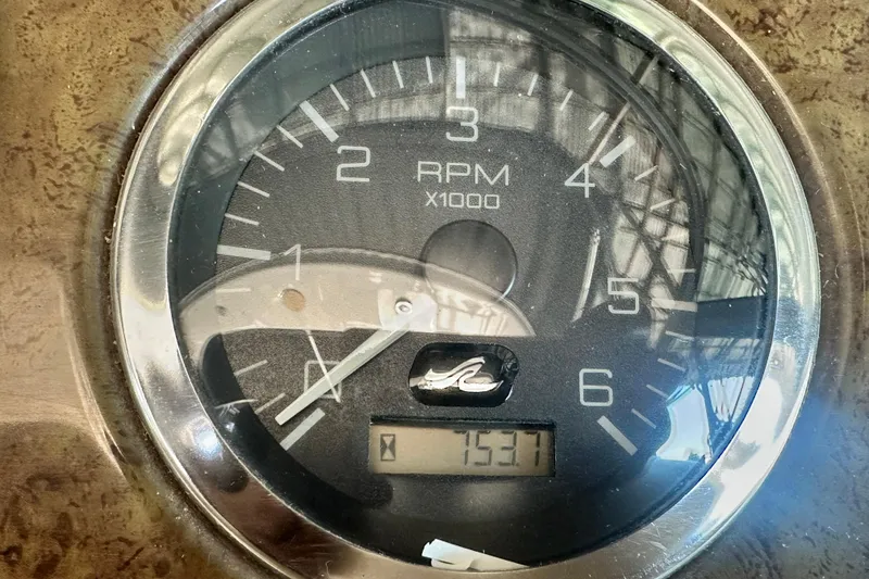 Slide: The Image of Tachometer of 2000 Sea Ray 310 Sundancer showing 1531 RPM. - 24