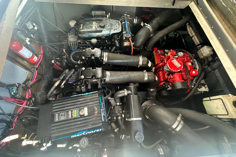 Slide: The Image of Engine compartment of a 2000 Sea Ray 310 Sundancer with MerCruiser components. - 50