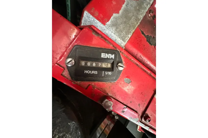 Slide: The Image of Hour meter reading 67.3 on a 2000 Sea Ray 310 Sundancer boat engine. - 51
