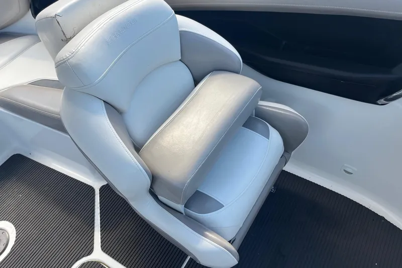 Slide: The Image of 2010 Sea-Doo 230 Challenger SP boat seat, white and gray upholstery. - 5