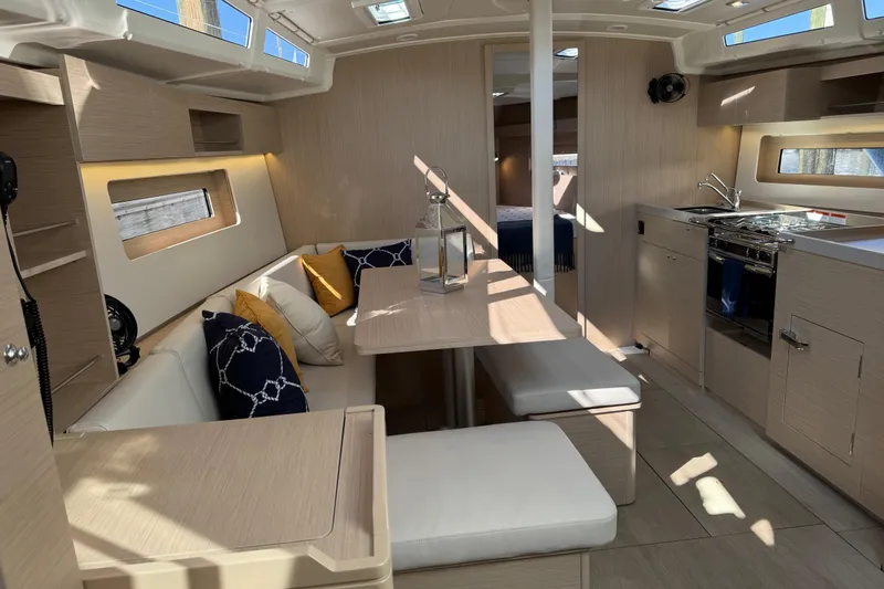 Slide: The Image of Modern interior of 2024 Beneteau Oceanis 37.1 yacht, featuring sleek design and cozy seating area. - 18