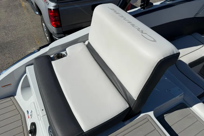 Slide: The Image of 2023 Crownline 240 SS SURF boat seat with cup holder, featuring sleek design and comfort. - 16