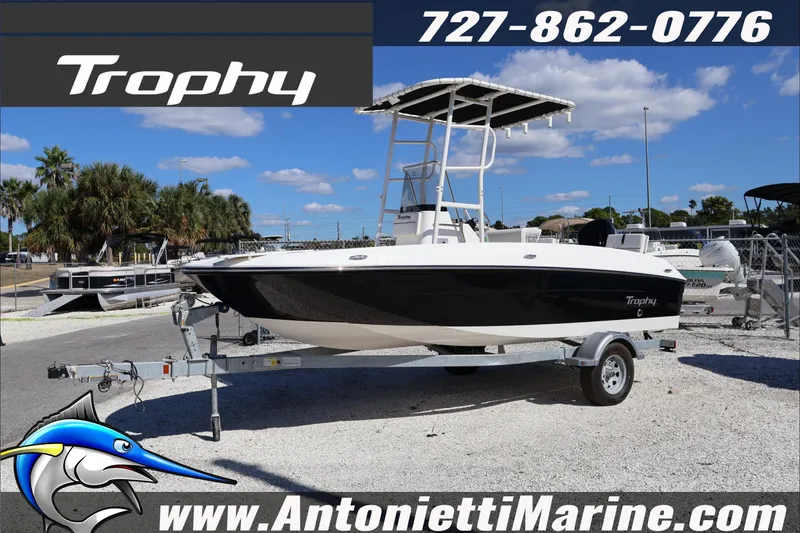 Slide: The Image of 2026 Trophy T18 Bay boat on trailer at Antonietti Marine dealership. - 5