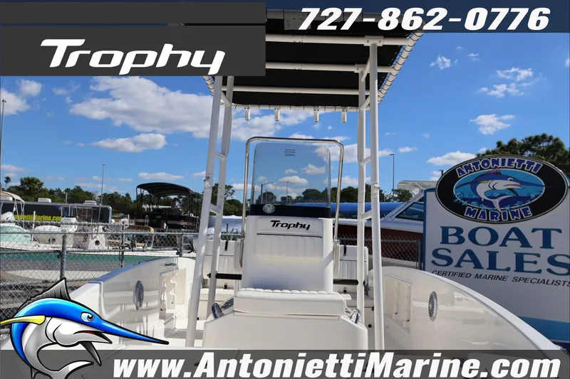 Slide: The Image of 2026 Trophy T18 Bay boat at Antonietti Marine sales, clear sky background. - 7