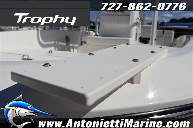 Slide: The Image of Trophy T18 Bay boat detail with contact info and website, 2026 model. - 8