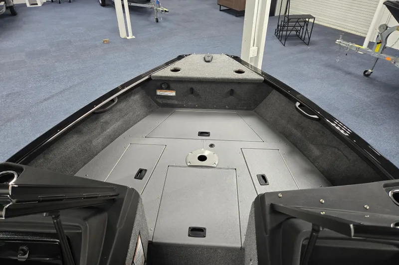 Slide: The Image of 2026 Princecraft Sport 175 boat interior with storage compartments and seating area. - 11