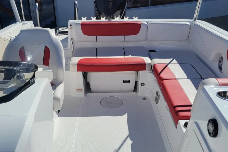 Slide: The Image of 2021 Tahoe 2150 boat interior with red and white seating, featuring a spacious layout. - 5