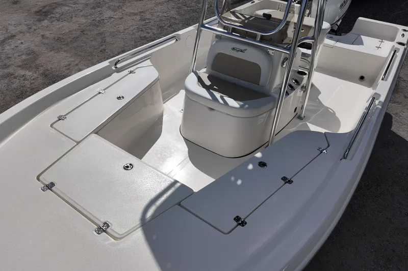 Slide: The Image of 2026 Bulls Bay 2200 boat interior with seating and storage compartments. - 16