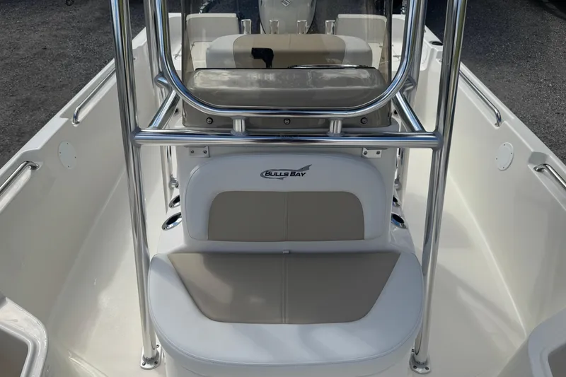 Slide: The Image of 2025 Bulls Bay 2200 boat interior with seating and stainless steel frame. - 17