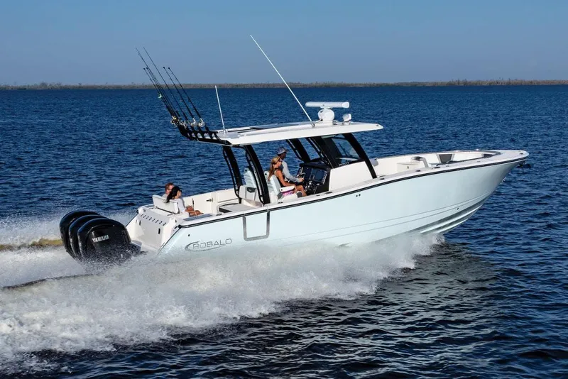 Slide: The Image of 2026 Robalo R360 Center Console boat dashboard with advanced navigation displays and controls. - 2