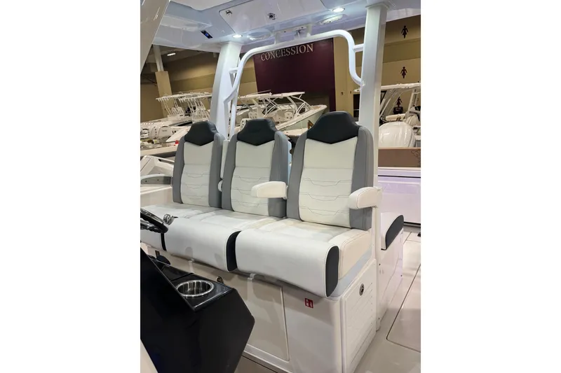Slide: The Image of 2026 Robalo R360 Center Console boat seating with modern design and comfortable upholstery. - 28