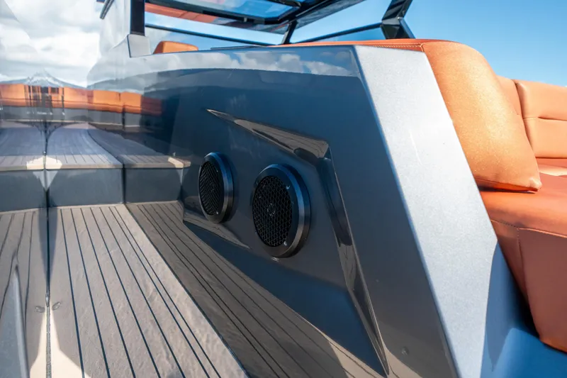 Slide: The Image of 2022 Vanquish Yachts VQ45 deck with sleek design and luxurious seating. - 12