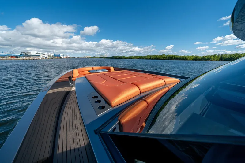 Slide: The Image of 2022 Vanquish Yachts VQ45 on water, featuring sleek design and luxurious seating. - 25