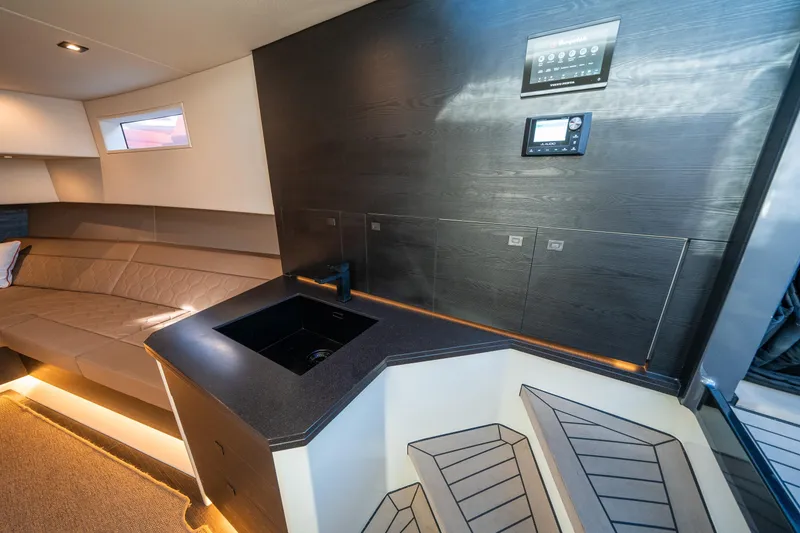 Slide: The Image of Luxurious interior of 2022 Vanquish Yachts VQ45 with modern design and sleek finishes. - 29