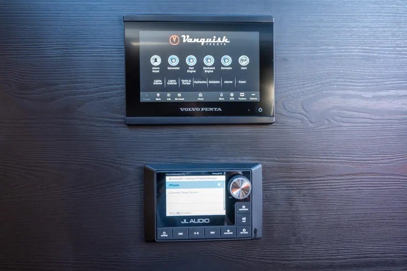 Slide: The Image of 2022 Vanquish Yachts VQ45 control panels with Volvo Penta and JL Audio systems. - 31