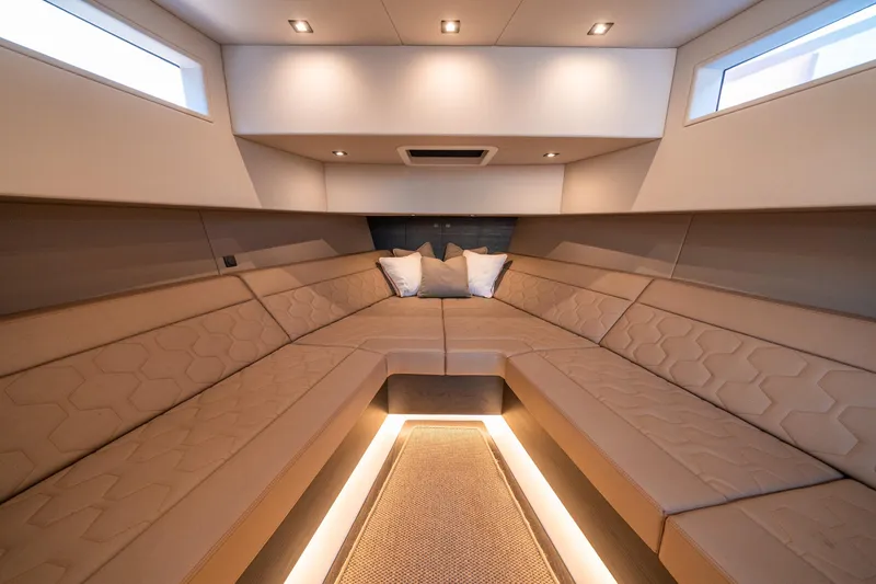 Slide: The Image of Luxurious interior of 2022 Vanquish Yachts VQ45 with elegant seating and ambient lighting. - 33