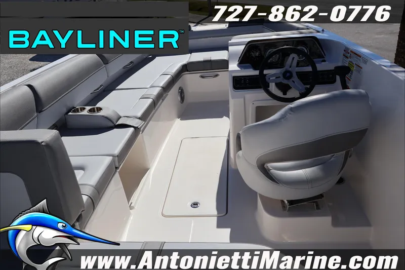 Slide: The Image of 2026 Bayliner D20 boat interior with seating and steering, Antonietti Marine branding. - 10