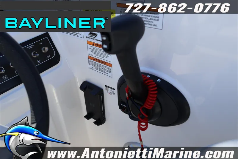 Slide: The Image of Bayliner D20 2026 boat control panel with throttle and warning labels. - 19
