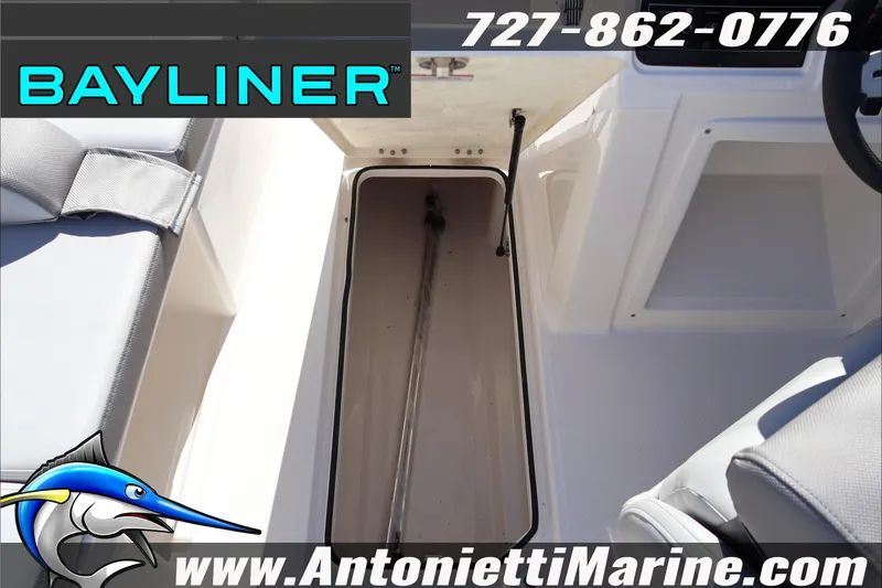Slide: The Image of Bayliner D20 2026 boat interior storage compartment, featuring sleek design and comfortable seating. - 24