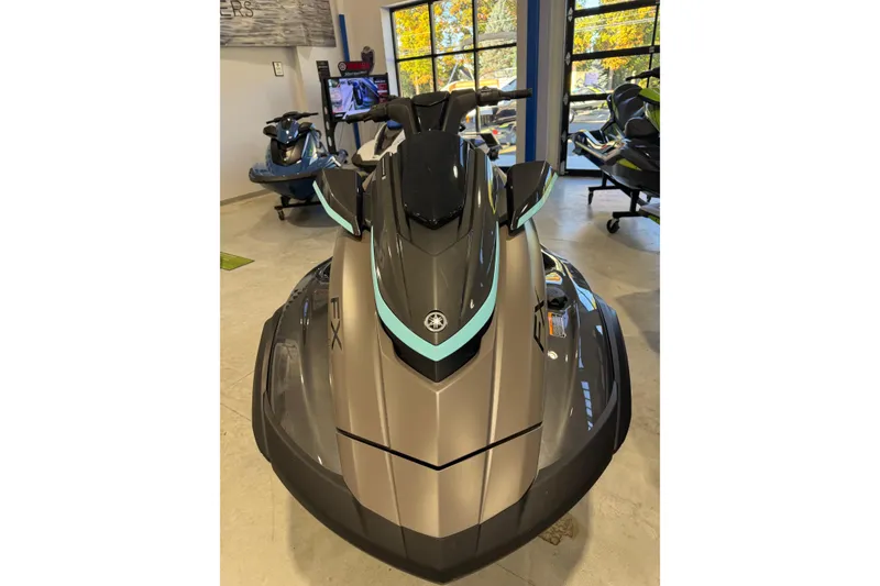 Slide: The Image of 2025 Yamaha WaveRunner FX HO in showroom, sleek design with modern features. - 10
