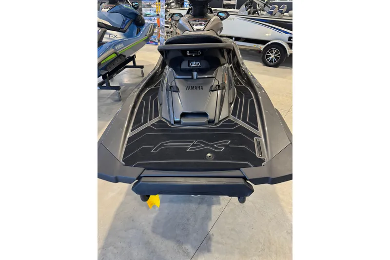 Slide: The Image of 2025 Yamaha WaveRunner FX HO jet ski displayed in showroom. - 9