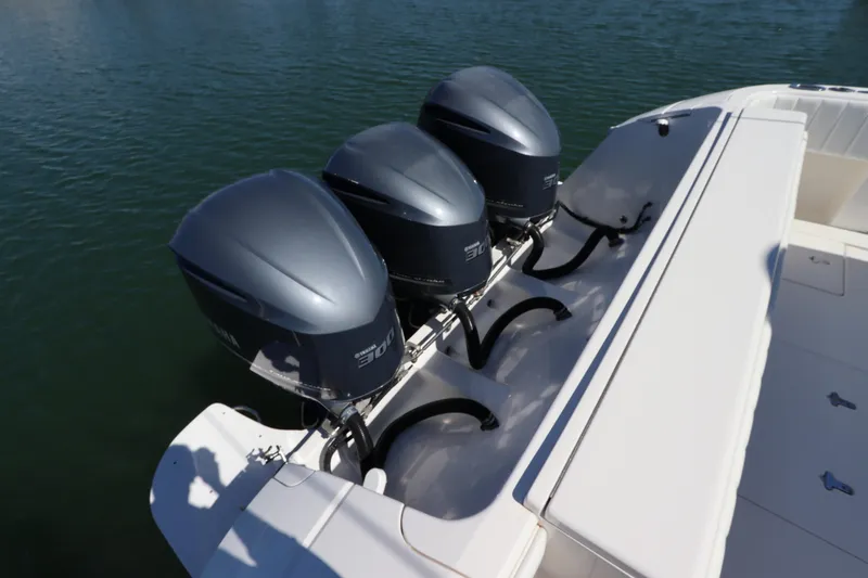 Slide: The Image of Triple Yamaha outboard engines on a 2012 Intrepid 430 Sport Yacht. - 15