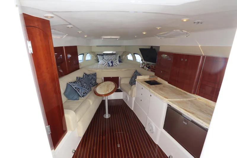 Slide: The Image of Luxurious interior of 2012 Intrepid 430 Sport Yacht with elegant wood finishes and plush seating. - 44