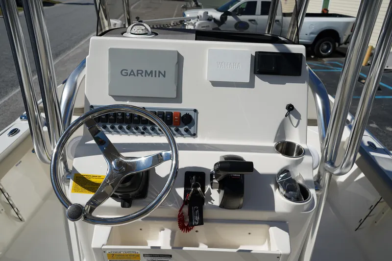 Slide: The Image of 2024 Key West 210 Bay Reef boat console with Garmin and Yamaha controls. - 25