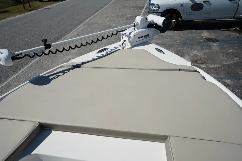 Slide: The Image of 2024 Key West 210 Bay Reef boat with Minn Kota trolling motor on deck. - 35
