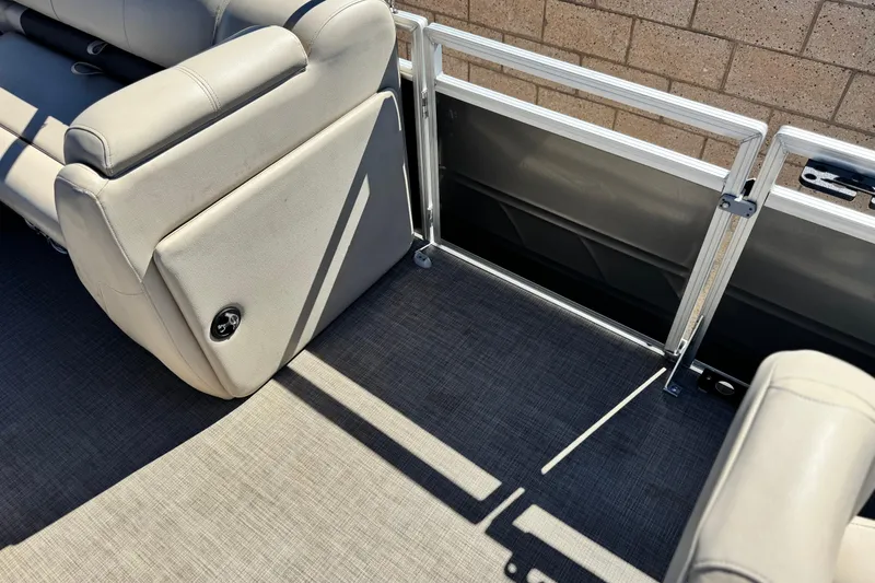 Slide: The Image of 2024 Sun Tracker Fishin' Barge 20 DLX interior seating and flooring detail. - 16