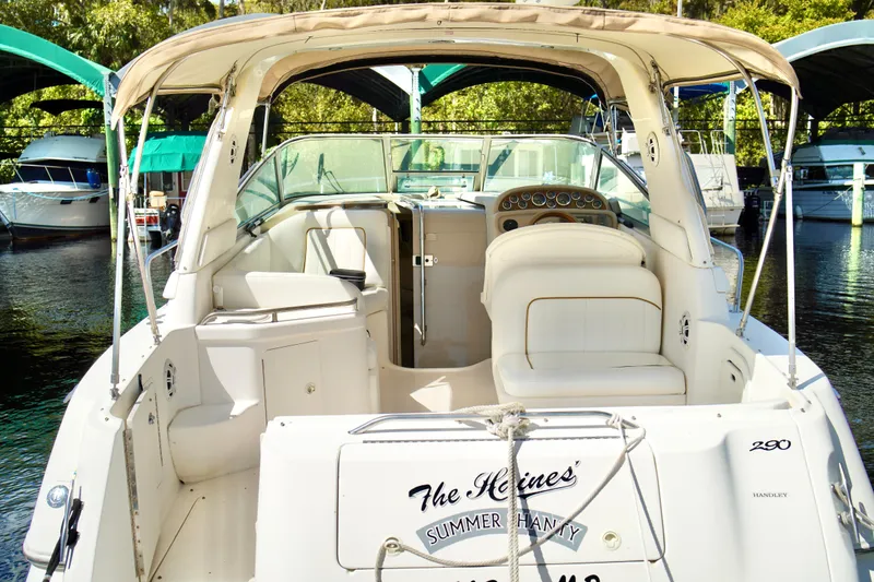 The Image of 2000 Sea Ray 280 Sundancer docked at marina under sunny skies. - 0