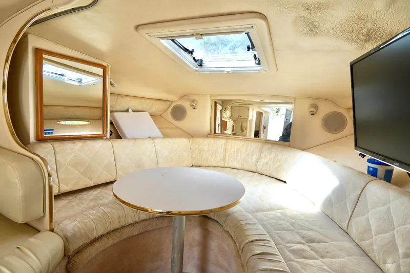 Slide: The Image of Interior of 2000 Sea Ray 280 Sundancer with Supersonic TV display. - 16
